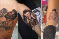 企鹅体育官网下载,球迷带着主题纹身亮相，吸引镜头不断